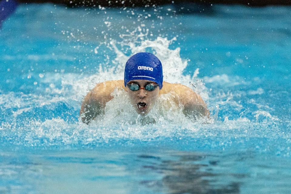 Norman's JD Thumann competes in the 100-yard butterfly during the Class 6A state meet on Feb. 17 at Edmond Schools Aquatic Center.