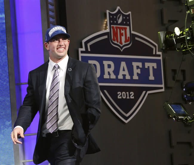 Stanford quarterback Andrew Luck walks on stage after he was selected as the first pick overall by the Indianapolis Colts in the first round of the NFL football draft at Radio City Music Hall, Thursday, April 26, 2012, in New York. (AP Photo/Mary Altaffer)