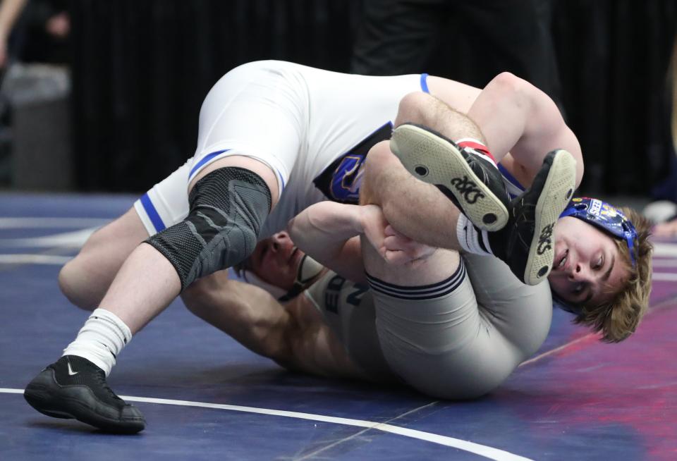 Stillwater's Kael Voinovich, right, wrestles Edmond North's Kody Routledge in the Class 6A 150-pound match during the dual state wrestling tournament finals at Stride Bank Center in Enid, Okla., Saturday, Feb. 11, 2023. 