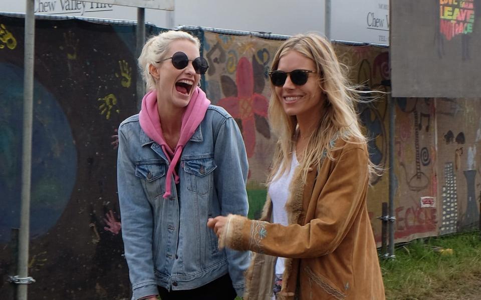 Poppy Delevingne (L) and Sienna Miller attend day 2 of the Glastonbury Festival - Credit:  Mark Boland/ Getty Images Europe