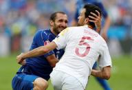 Football Soccer - Italy v Spain - EURO 2016 - Round of 16 - Stade de France, Saint-Denis near Paris, France - 27/6/16 Italy's Giorgio Chiellini and Spain's Sergio Busquets REUTERS/John Sibley Livepic