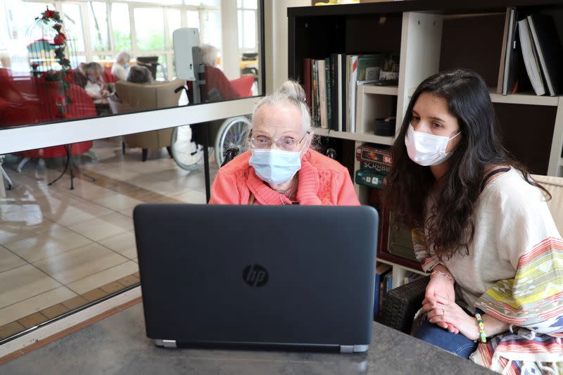 Elderly people and students studying French use video conference to beat lockdown blues