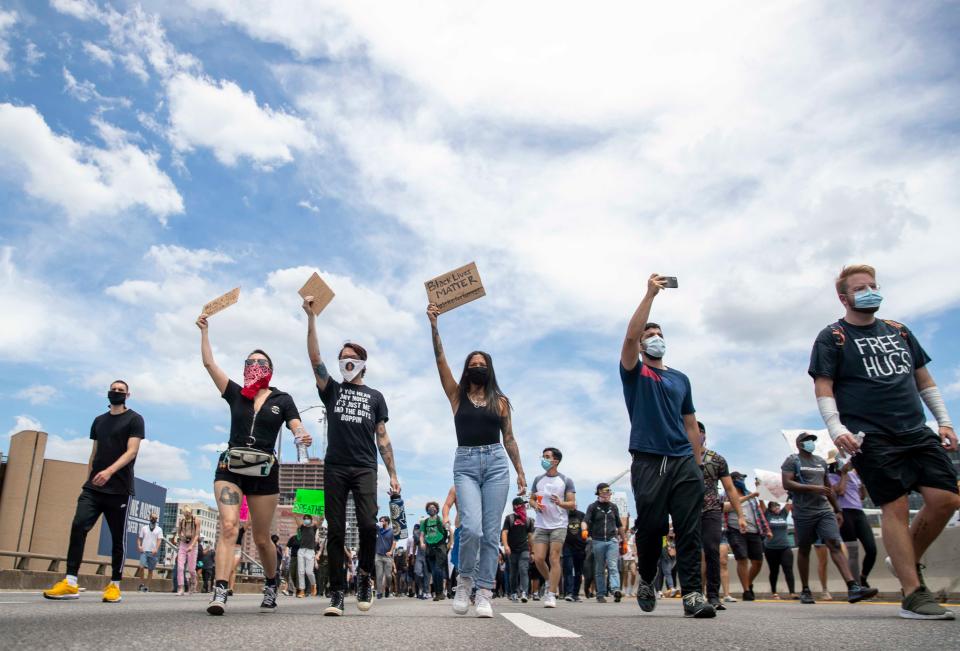 Protesters shut down southbound Interstate 35 on May 30, 2020, in Austin, Texas, after the death of George Floyd in police custody.