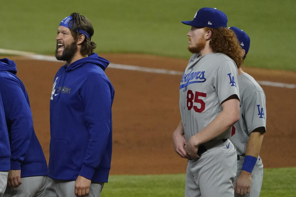 Los Angeles Dodgers starting pitcher Clayton Kershaw celebrates their win against the Tampa Bay Rays in Game 5 of the baseball World Series Sunday, Oct. 25, 2020, in Arlington, Texas. Dodgers beat the Rays 4-2 to lead the series 3-2 games. (AP Photo/Tony Gutierrez)