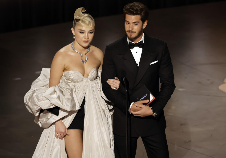 Florence Pugh and Andrew Garfield speak on stage during the 2023 Academy Awards