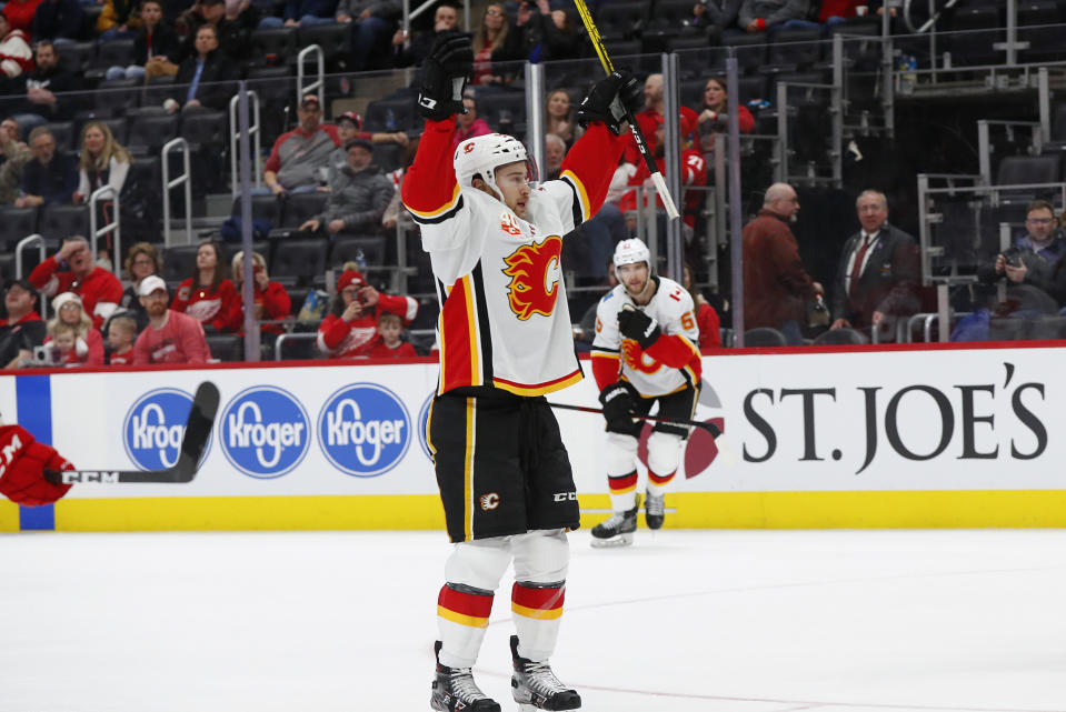 Calgary Flames left wing Andrew Mangiapane (88) celebrates his goal against the Detroit Red Wings in the second period of an NHL hockey game Sunday, Feb. 23, 2020, in Detroit. (AP Photo/Paul Sancya)