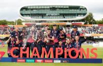 England players celebrate winning the world cup with the tophy and spraying sparkling wine Action Images via Reuters/John Sibley