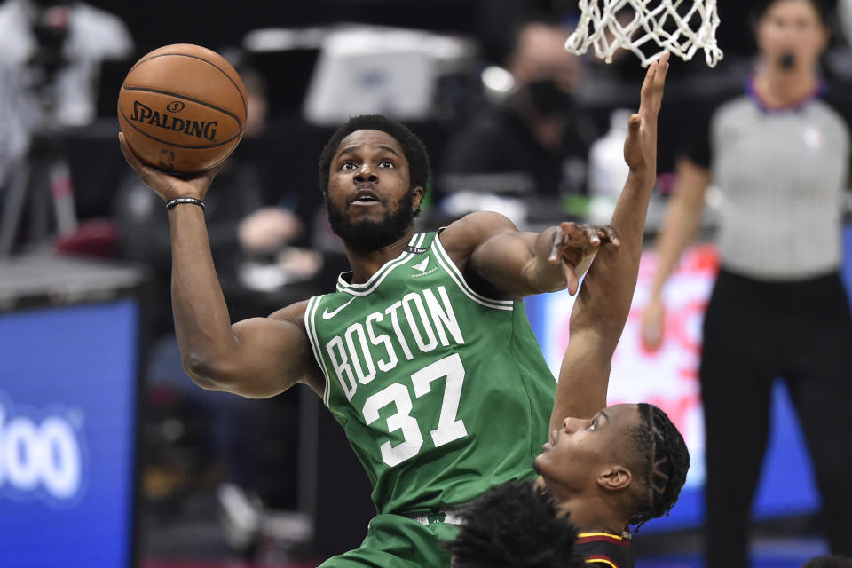 Mar 17, 2021; Cleveland, Ohio, USA; Boston Celtics forward Semi Ojeleye (37) drives to the basket against the Cleveland Cavaliers in the second quarter at Rocket Mortgage FieldHouse. 