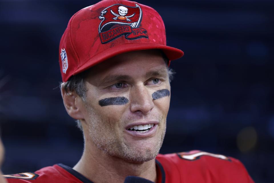 Tampa Bay Buccaneers quarterback Tom Brady gives a broadcast interview after the team's NFL football game against the Dallas Cowboys in Arlington, Texas, Sunday, Sept. 11, 2022. (AP Photo/Ron Jenkins)
