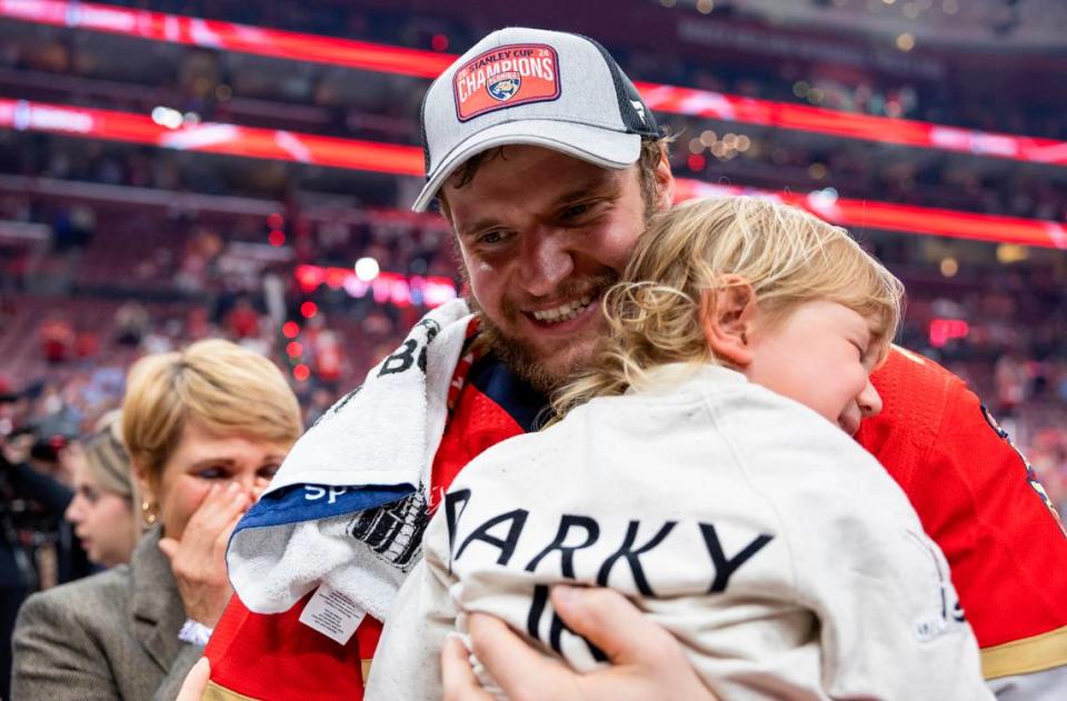 Florida Panthers center Aleksander Barkov (16) hugs his family during a celebration after the Panthers won the Stanley Cup.