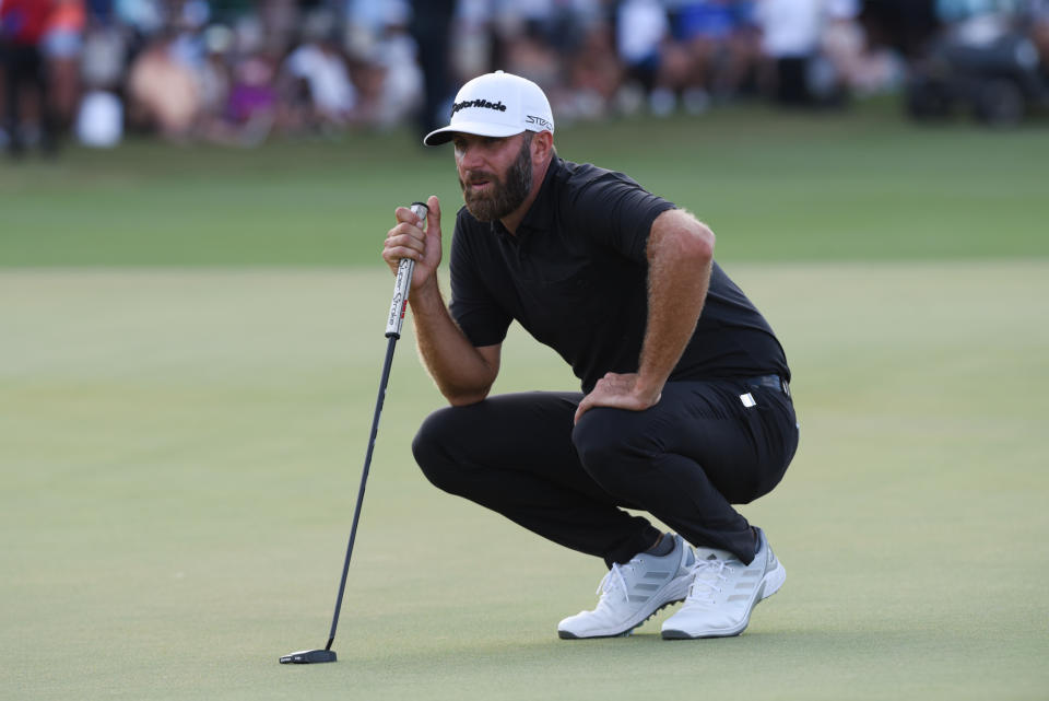 DORAL, FL - OCTOBER 27: Dustin Johnson prepares to hit the ball at the LIV Golf Team Championship, on October 30, 2022 at Trump National Doral Golf Club in Doral, FL. (Photo by Michele Eve Sandberg/Icon Sportswire via Getty Images)