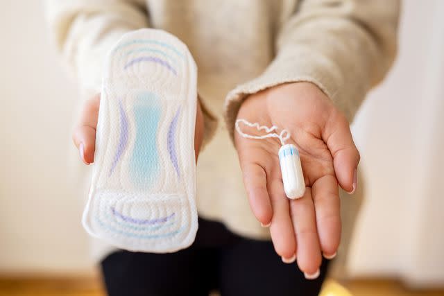 <p>bymuratdeniz/Getty</p> Stock image of menstrual products.