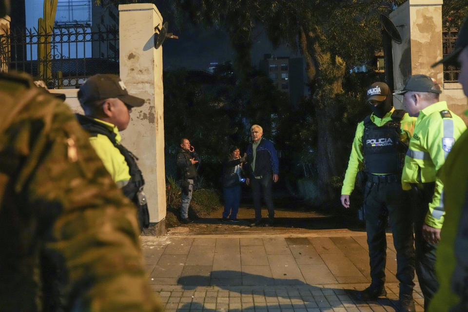 Roberto Canseco, of the Mexican consulate, stands at an entrance of the Mexican embassy in Quito, Ecuador, after Ecuadorian police forcibly broke into the premises, Friday, April 5, 2024. The raid took place hours after the Mexican government granted former Ecuadorian Vice President Jorge Glas political asylum. (AP Photo/Dolores Ochoa)