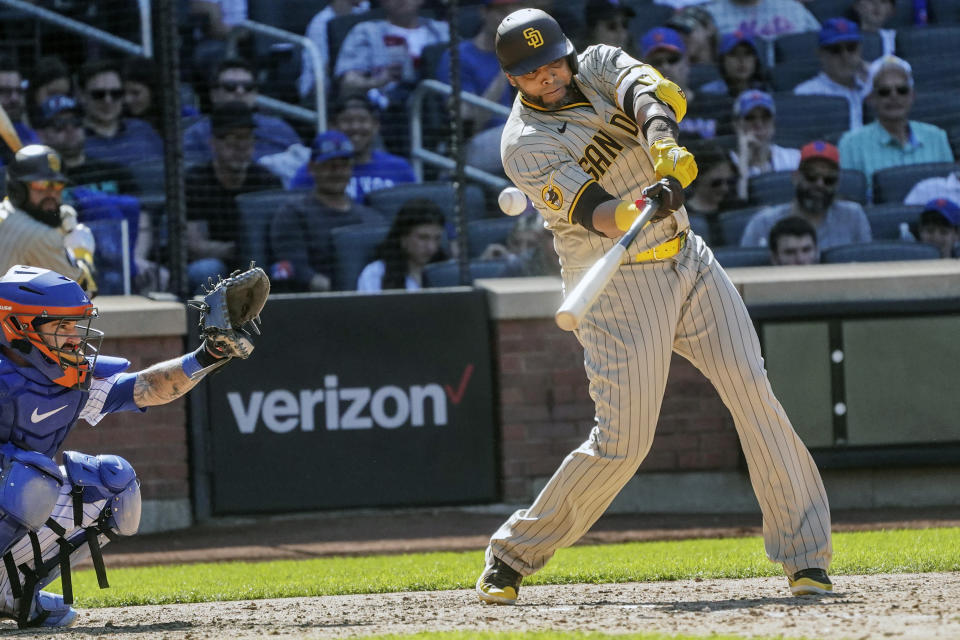 San Diego Padres designated hitter Nelson Cruz hits a single in the eighth inning during a baseball game against the New York Mets, Wednesday, April 12, 2023, in New York. (AP Photo/Bebeto Matthews)