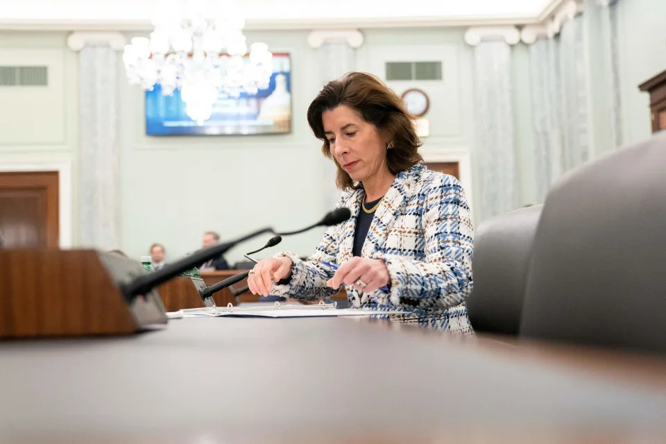 US Commerce Secretary Gina Raimondo arrives to testify before the Senate Commerce, Science and Transportation Committee during a hearing on