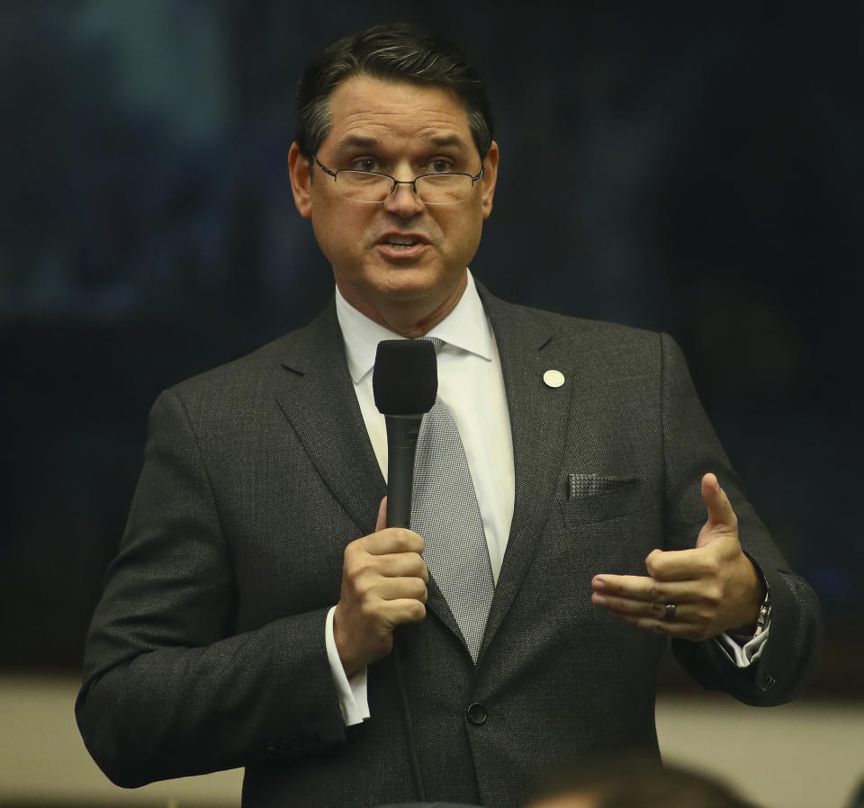 Rep. Cord Byrd, R-Neptune Beach, answers a question during debate over House Bill 527 - Federal Immigration Enforcement, which prohibits sanctuary policies, Tuesday April 23, 2019 in the Florida House of Representatives in Tallahassee, Fla. (AP Photo/Phil Sears)