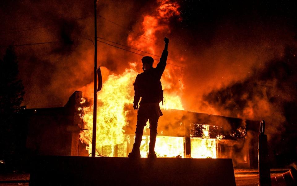 Swathes of Minneapolis were damaged during last year's unrest - AFP