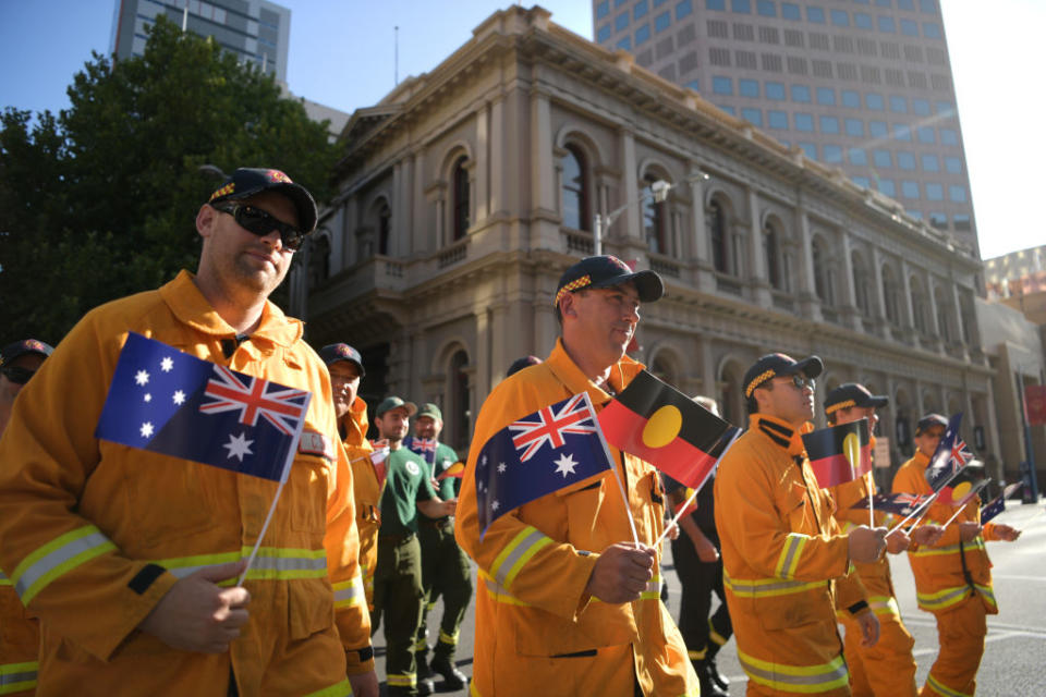 Volunteer firefighters take part in the Australia Day Parade in Adelaide.