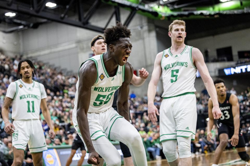 Utah Valley’s Aziz Bandaogo reacts during the Wolverines’ 74-68 win over Cincinnati in the quarterfinals of the NIT at the UCCU Center in Orem on Wednesday, March 22, 2023.