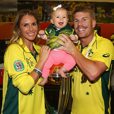 David Warner with partner Candice Falzon and their baby.