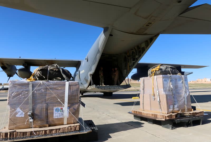 A view shows aid packages to be loaded into a plane in Zarqa