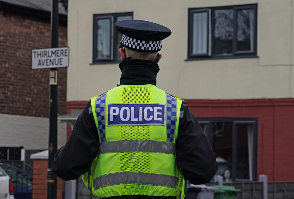 Police at the scene after a 16-year-old boy was fatally stabbed on Thirlmere Avenue in Stretford, Manchester. Paramedics treated the boy at the scene before he was taken to hospital where he died of his injuries. Picture date: Sunday January 23, 2022.