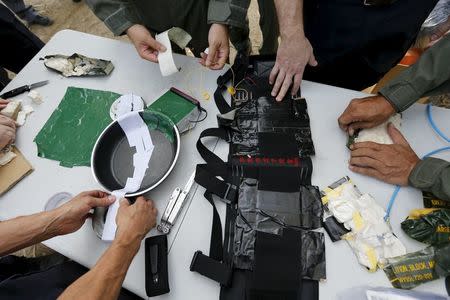 Experts from the U.S. Bureau of Alcohol, Tobacco, Firearms and Explosives (ATF) prepare improvised explosive devices (IEDs), which will be detonated during a course on blast scene investigation, near Hua Hin, Thailand January 17, 2016. REUTERS/Jorge Silva