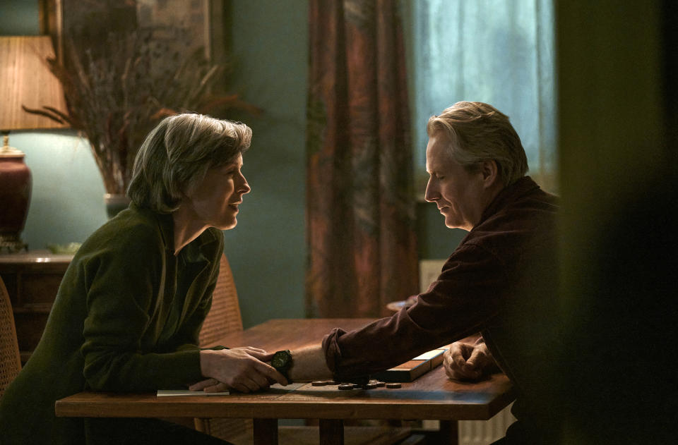 This image released by Amazon shows Gina McKee, left, and Linus Roache in a scene from "My Policeman." (Amazon via AP)