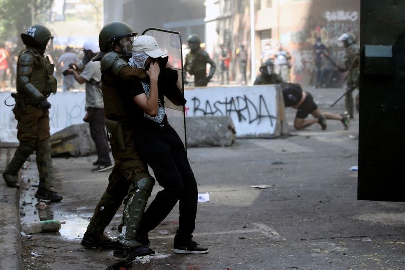 Protest against Chile's government during the one-year anniversary in Santiago of the protests and riots in 2019