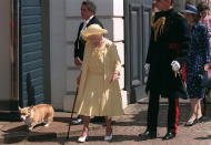 LONDON, UNITED KINGDOM - AUGUST 04: The Queen Mother With Her Corgi Goes To Greet The Crowd Who Have Gathered Outside Clarence House In London To Celebrate Her 99th Birthday. (Photo by Tim Graham Photo Library via Getty Images)