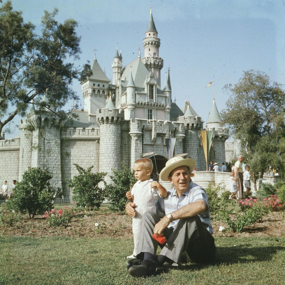 King of the castle: Walt Disney with his grandson at the original Disneyland in California, 1955 - Gene Lester