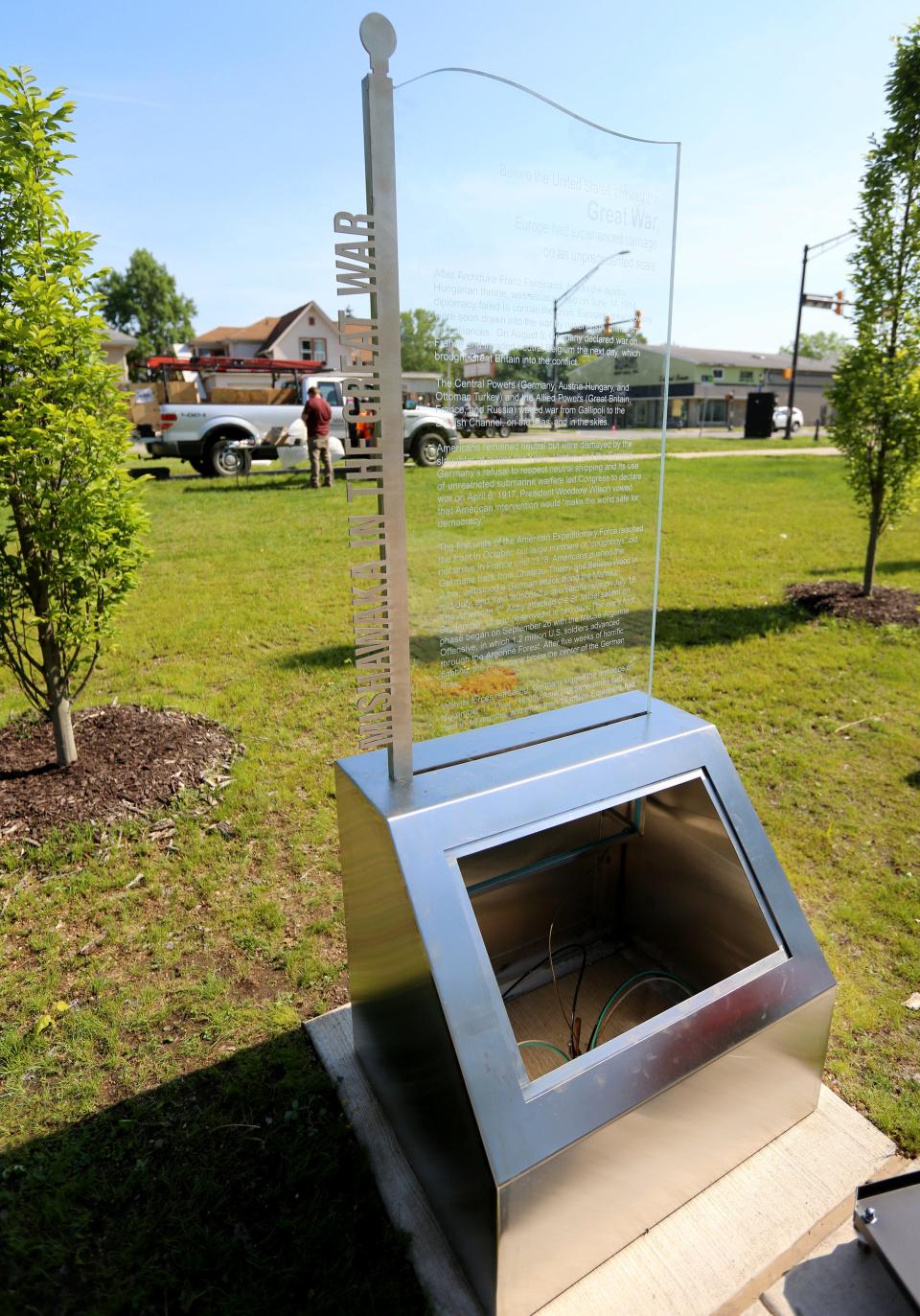 Work continues Tuesday, May 21, 2024, on the 16 etched glass informational slates lit by LED lighting along a veterans walkway and new monument going up west of the existing Soldiers and Sailors Monument in Battell Park. Mayor Dave Wood plans to dedicate the new walkway and monument honoring local veterans Saturday morning at 9 a.m.