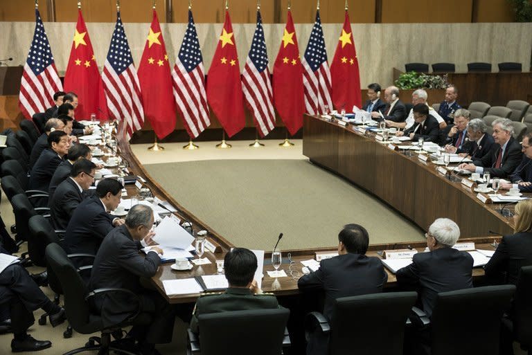 US Deputy Secretary of State William J. Burns (lower R) and other officials meet with Chinese counterparts at the US Department of State July 11, 2013 in Washington. The United States and China said Thursday they had moved forward on a treaty that would ramp up investment as the world's two largest economies highlighted progress in often strained ties