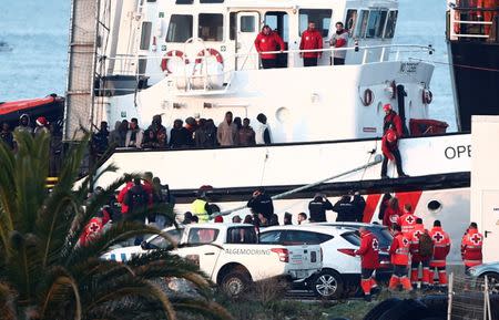 NGO Proactiva Open Arms' rescue boat is seen docked with migrants rescued in central Mediterranean Sea, at the Center for Temporary Assistance to Foreigners (CATE) in the port of Algeciras, in Campamento, Spain December 28, 2018. REUTERS/Jon Nazca