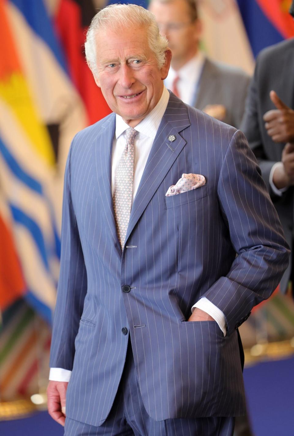 Prince Charles, Prince of Wales smiles as he departs the CHOGM opening ceremony at Kigali Convention Centre
