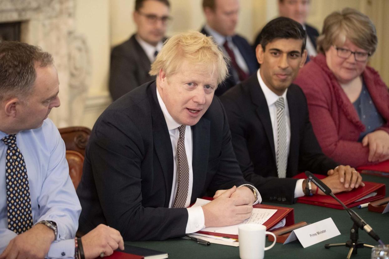 First challenge: Chancellor Rishi Sunak at a Cabinet meeting with Boris Johnson: Getty Images