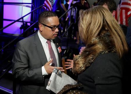Rep. Keith Ellison (D-MN), a candidate for Democratic National Committee Chairman, speaks to a supporter after a Democratic National Committee forum in Baltimore, Maryland, U.S., February 11, 2017. REUTERS/Joshua Roberts