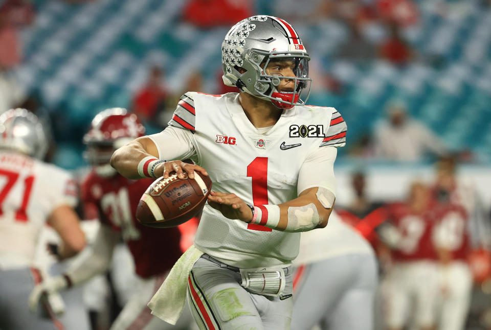 Justin Fields is one of five QBs who could go in the top five of the draft. (Photo by Mike Ehrmann/Getty Images)