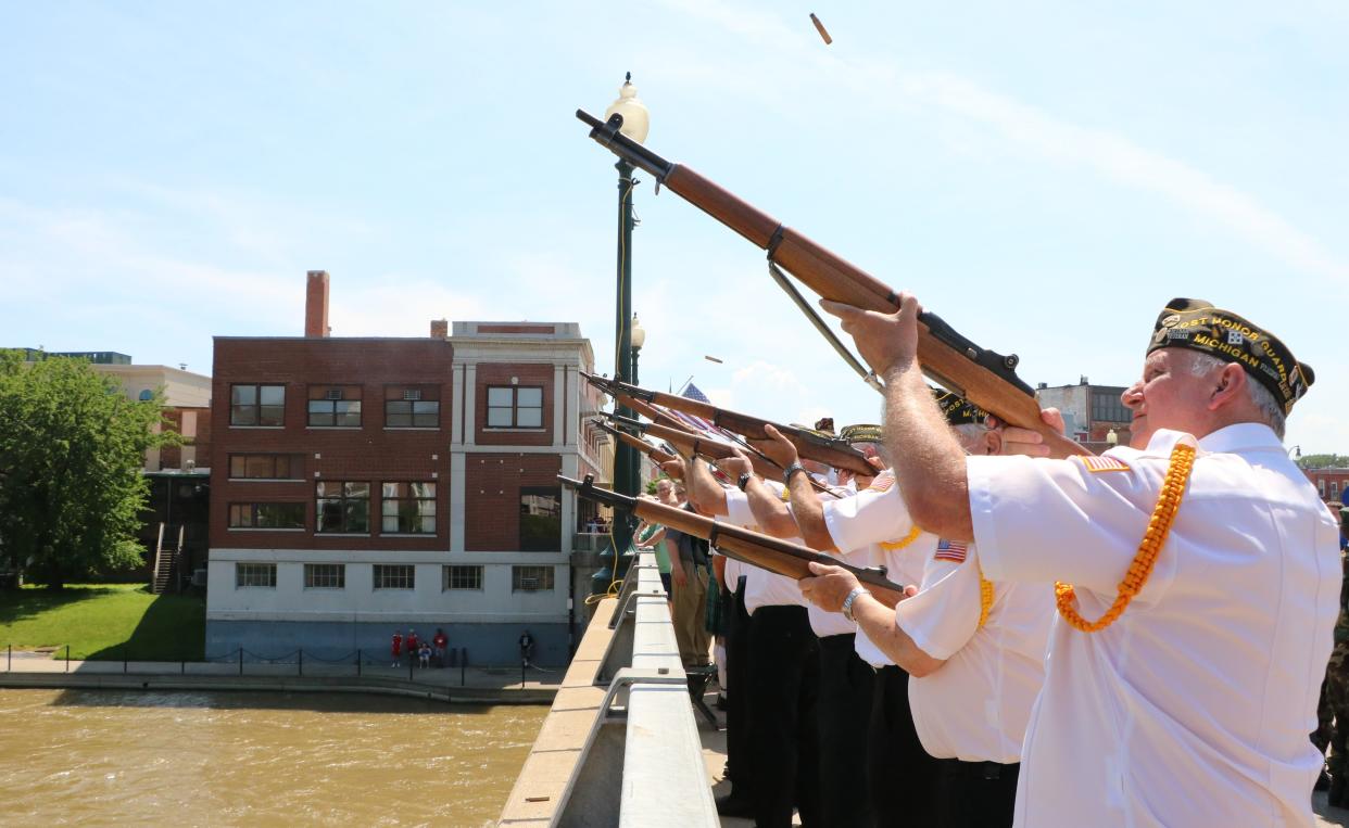 A 21-gun salute was carried out during the Monroe Street Bridge ceremony that followed the Memorial Day Parade in downtown Monroe in 2018. This year's Monroe Memorial Day Parade is Monday.