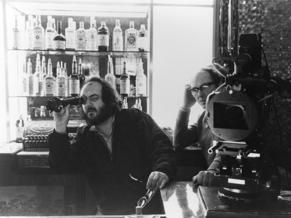 Kubrick on the set of "The Shining" looking through a lense