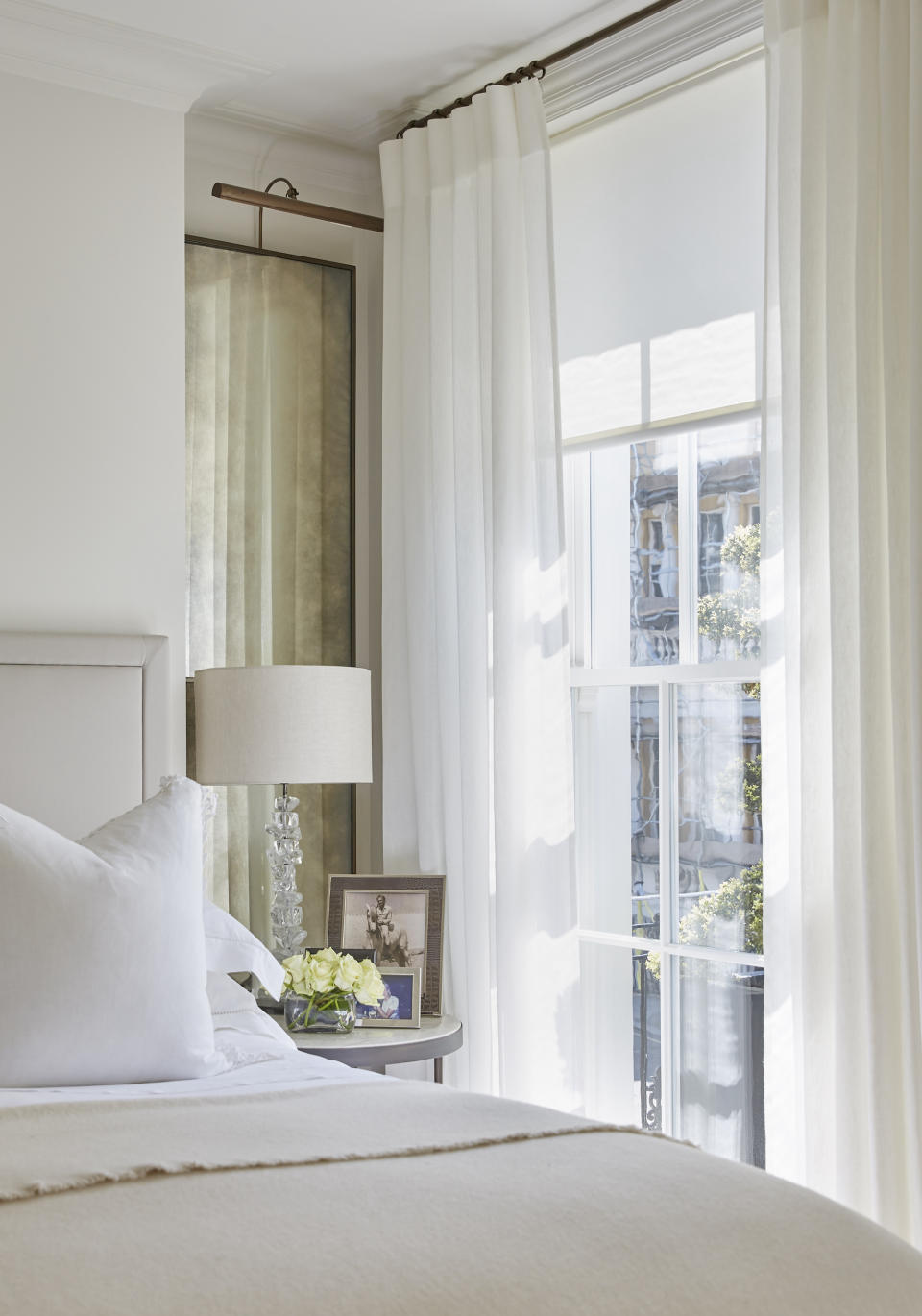 Opt for light and airy curtain ideas in a small bedroom