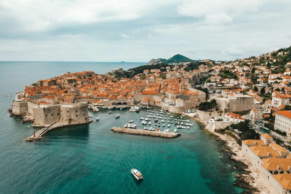 The Old City Harbour is part of  Dubrovick’s 15th-century fortress wall (Spencer Davis/Unsplash)