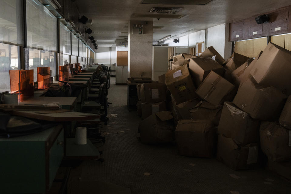 Abandoned betting counters at the Macao Jockey Club in Macao, Saturday, March 30, 2024. After more than 40 years, Macao’s horse racing track hosted its final races on Saturday, bringing an end to the sport in the city famous for its massive casinos. (AP Photo/Louise Delmotte)