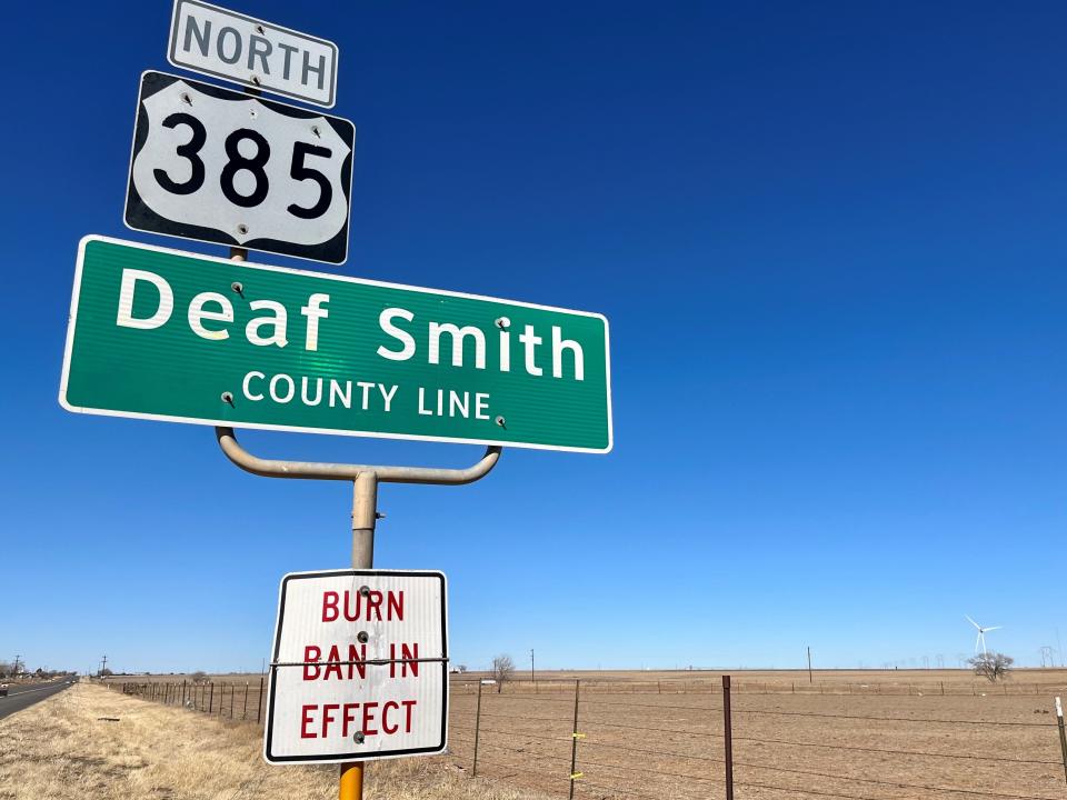 A sign marks the Deaf Smith-Castro county line just south of Hereford in February 2023.