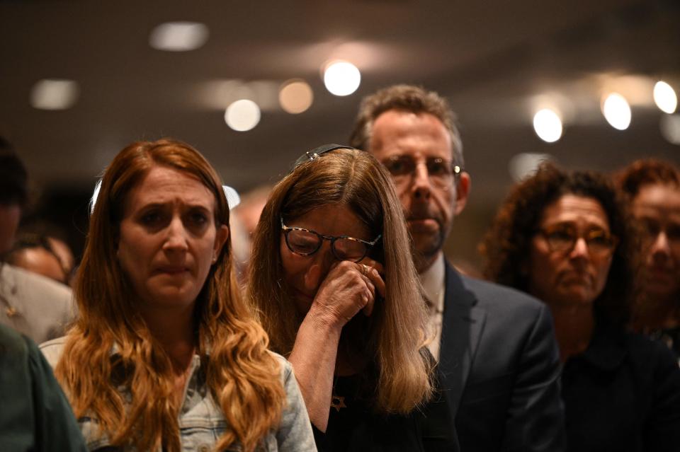 People attend a vigil for Israeli victims at the Stephen Wise Temple, in Los Angeles on Sunday after the Palestinian militant group Hamas launched an attack on Israel.