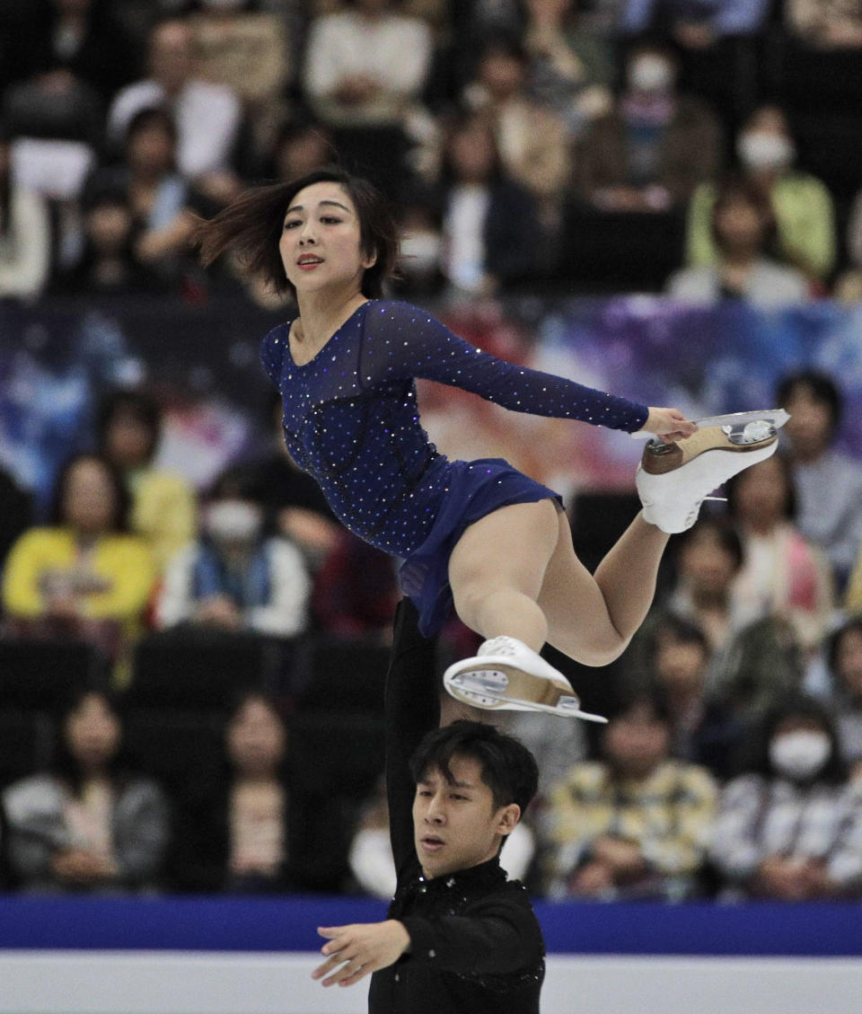 China's Sui Wenjing and Han Cong perform their pairs free skate during the ISU World Figure Skating Championships at Saitama Super Arena in Saitama, north of Tokyo, Thursday, March 21, 2019. (AP Photo/Andy Wong)