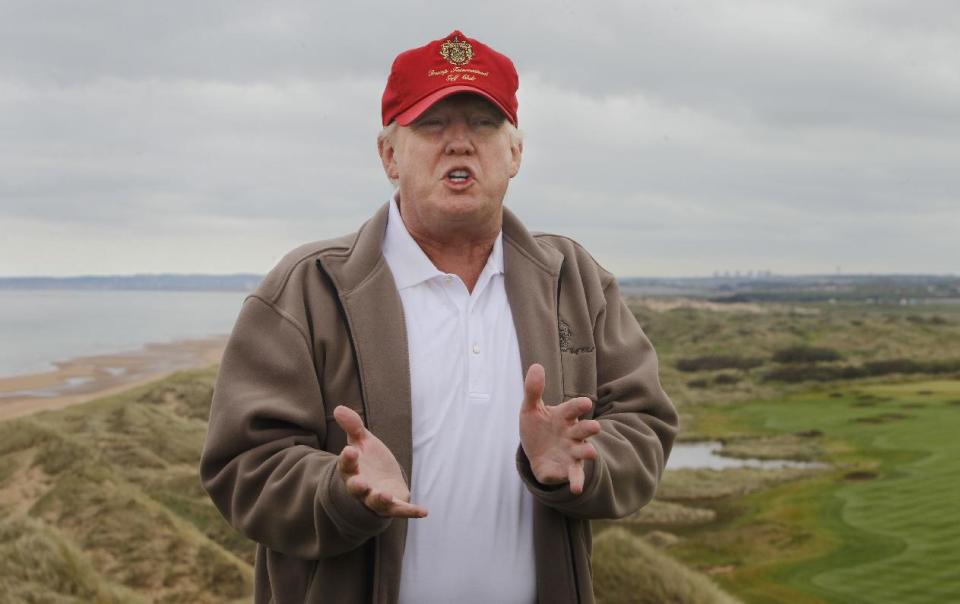 Donald Trump talks about his plans for The MacLeod Course, his second Scottish golf course, during a visit to the Trump International Golf Links, at his Aberdeenshire golf resort, in Scotland.