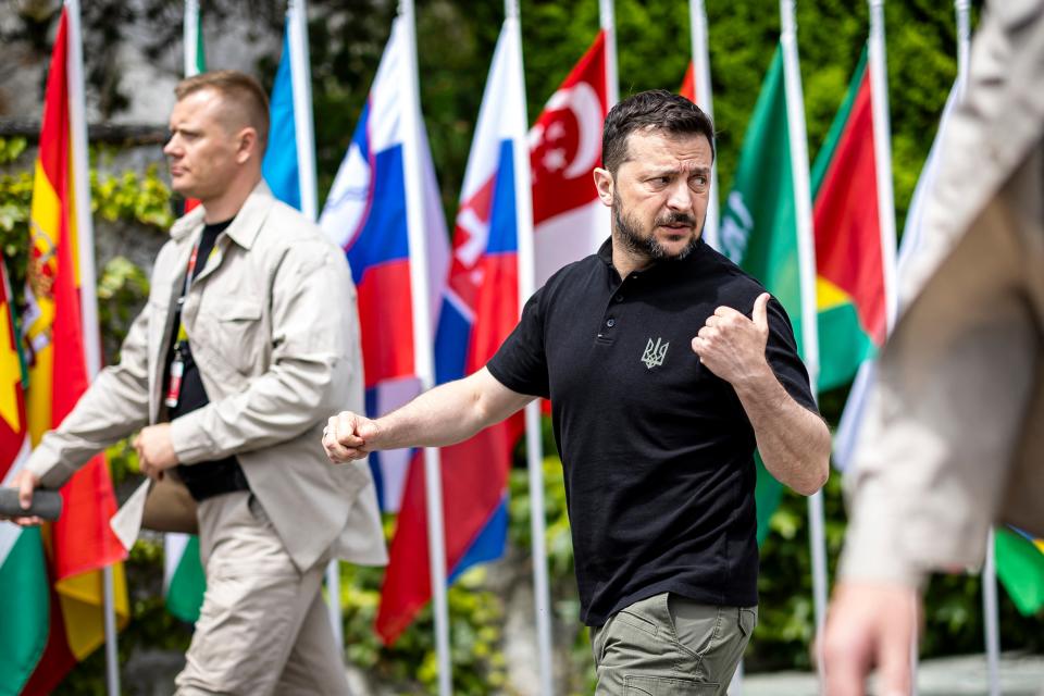Ukraine's President Volodymyr Zelensky (C) walks to attend bilateral talks during the Summit on peace in Ukraine (POOL/AFP via Getty Images)