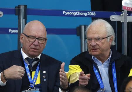 Curling - Pyeongchang 2018 Winter Olympics - Women's Final - Sweden v South Korea - Gangneung Curling Center - Gangneung, South Korea - February 25, 2018 - Sweden's King Carl Gustav (R) watches the match. REUTERS/Phil Noble