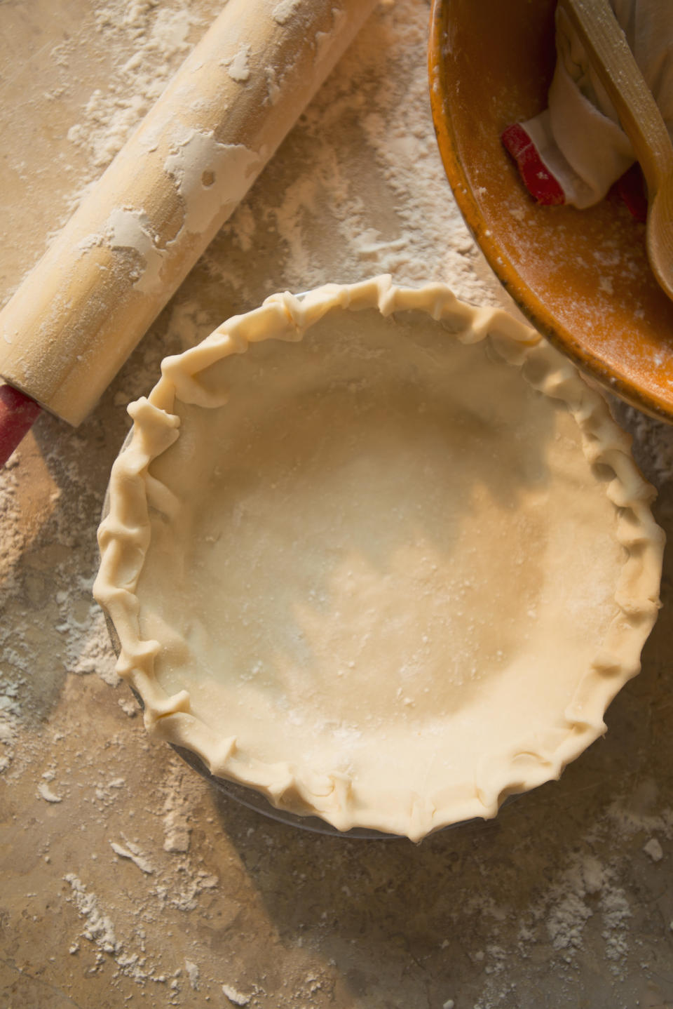 Close up of an empty pie shell.